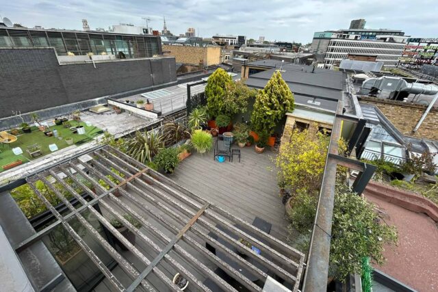 Flat roof conversion terrace garden builder Shoreditch London, installing a structure with structural joists & treated structural steels.