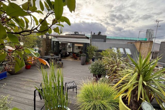 Flat roof conversion terrace garden builder Shoreditch London, installing a structure with structural joists & treated structural steels.