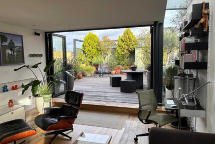 Flat roof conversion terrace garden builder Shoreditch London, installing a structure with structural joists & treated structural steels.