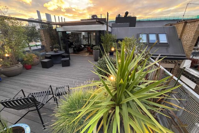 Flat roof conversion terrace garden builder Shoreditch London, installing a structure with structural joists & treated structural steels.