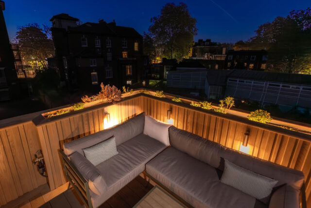 Ambient LED lighting design integrated into a custom Highbury terrace deck.